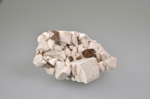 Quartz on Microcline, Mt. White, Chaffee County, Colorado, Betty Kalaskie Collection #988, Miniature 3.5 x 4.5 x 8.5 cm, $25.  Online  9/5.