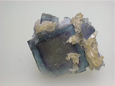 Calcite on Fluorite, Rosiclare Level Minerva #1 Mine, Ozark-Mahoning Company, Cave-in-Rock District, Southern Illinois, Mined c. 1992-1993, Tolonen Collection, Miniature 2.0 x 2.0 x 4.0 cm, $250.  SOLD