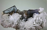 Barite on Fluorite, Rosiclare Level Minerva #1 Mine attr., Allied Chemical Company attr., Cave-in-rock District, Southern Illinois, Mined ca. early 1970's, Noll Collection #4722, Medium Cabinet 6.0 x 8.0 x 10.5 cm, $450. Online 3/11.  SOLD.