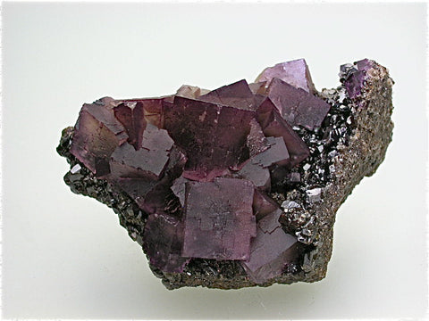 Fluorite and Sphalerite, Hill-Ledford Mine attr., Ozark-Mahoning Company, Cave-in-Rock District, Southern Illinois, Mined ca. 1960s, Fowler Collection, Small Cabinet 5.0 x 7.0 x 11.5 cm, $150. Online 7/21.