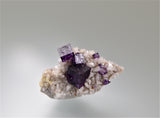 Fluorite on Dolomite, Elmwood Complex, Smith County, Tennessee, Mined c. 1990's, Ralph Campbell Collection, Miniature 2.0 x 2.0 x 4.0 cm, $35. Online 10/4.
