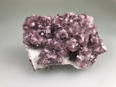 Fluorite on Quartz, County Durham, Weardale, England, Mined c. early 20th Century, ex. Tom Wiesner Collection 431, Ron Roberts Collection D-34, Small Cabinet 2.5 x 6.5 x 8.5 cm, $200. Online 5/11.