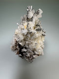 Marcasite and Barite on Fluorite, Rosiclare Level, West Green Mine attr., Ozark-Mahoning Company, Cave-in-Rock District, Southern Illinois, Mined c. 1970s, ex. Ron Roberts Collection BF-13, Miniature 5 x 7 x 3.5 cm., $125. Online 1/6.