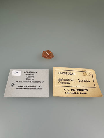 Grossular, Asbestos, Quebec, Canada, ex. William Mickols Collection 315, Thumbnail, 1.0 x 1.3 x 1.6 cm, $25. Online 3/2.