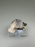 Herderite with Elbaite, attr. Xanda Mine, Virgem da Lapa, Minas Gerais, Brazil, Mined c. early 2000s, ex. William Mickols Collection 561, Miniature, 2.4 x 2.5 x 4.0 cm, $300. Online 3/2.