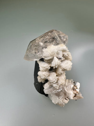 Quartz and Albite on Elbaite, Gilgit, Pakistan, Mined c. 1990s, ex. WIlliam Mickols Collection, Miniature, 2.5 x 4 x 5 cm, $50. Online Oct. 9.