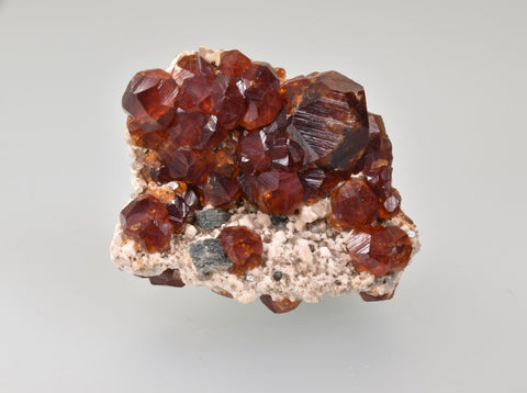 Spessartine and Mica on Feldspar, Tongbei Area, Yunxiao County, Fujian Province, China, Collected c. 2005, Betty Kalaskie Collection #709, Miniature 1.0 x 3.5 x 4.8 cm, $250.  Online  9/5.