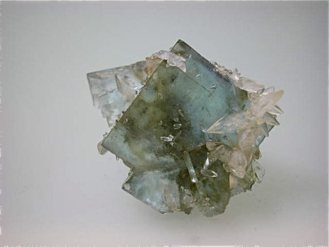 Calcite on Fluorite, Rosiclare Level Minerva #1 Mine, Ozark-Mahoning Company, Cave-in-Rock District, Southern Illinois, Mined ca. 1992-1993, Koster Collection, Miniature 2.5 x 5.0 x 4.0 cm, $125. Online 03/04.  SOLD.