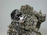 Pyrite after Pyrrhotite with Sphalerite and Arsenopyrite, Trepca Complex, Kosovska Municipality, near Mitrovica, Kosovo Small cabinet 5 x 5.5 x 6.5 cm $125. Mined 2014. Online 10/21. SOLD.