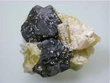 Alstonite and Barite on Fluorite and Sphalerite, Minerva #1 Mine, attr. Bethel Level, Minerva Oil Company, Cave-in-Rock District, Southern Illinois miniature 3 x 5.5 x 6.5 cm $75. Online 3/18. SOLD.