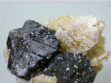 Alstonite and Barite on Fluorite and Sphalerite, Minerva #1 Mine, attr. Bethel Level, Minerva Oil Company, Cave-in-Rock District, Southern Illinois miniature 3 x 5.5 x 6.5 cm $75. Online 3/18. SOLD.