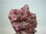 Rhodochrosite with Pyrite, Silver Bow County, Butte, Montana 3 x 4 x 4.5 cm $350. Online 9/06. SOLD.