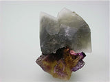 Small chip on fluorite crystal at bottom center