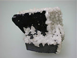 Calcite on Fluorite, Sub-Rosiclare Level, Lillie Pod Denton Mine, Ozark-Mahoning Company, Harris Creek District, Southern Illinois, Mined c. 1983, Tolonen Collection, Small Cabinet 5.0 x 7.0 x 8.0 cm, $250.  Online 1/13.  SOLD.