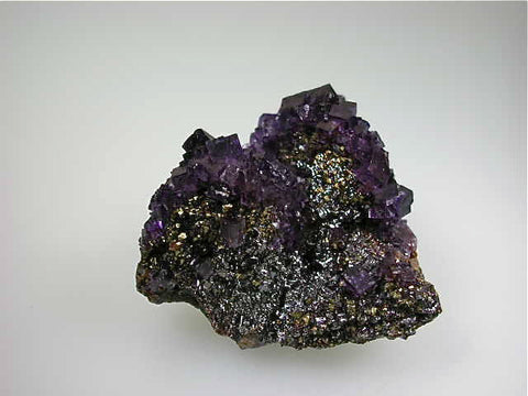 Fluorite on Sphalerite and Chalcopyrite, Rosiclare Level Main Orebody Denton Mine, Ozark-Mahoning Company, Harris Creek District, Southern Illinois, Mined ca. 1983, Koster Collection #00668, Miniature 4.5 x 6.0 x 7.0 cm, $150. Online 03/07.  SOLD.