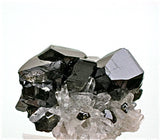 SOLD Cassiterite on Quartz, Viloco Mine, Loayza Province near La Paz, Bolivia, Miniature 2.0 x 3.0 x 4.0 cm, $300. Online 2/27.
