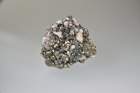 Pyrite and Calcite on Downey's Bluff Limestone, Bethel Level, attr. M.F. Oxford #7 Mine, Ozark-Mahoning Company, Cave-in-Rock District, Southern Illinois, Mined c. early 1970's, Holzner Collection #363, Miniature 3.0 x 5.5 x 6.0 cm, $225. Online 8/10.