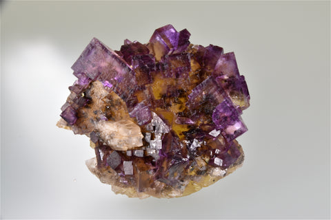 Fluorite with Calcite, Rosiclare Level Denton Mine, Ozark-Mahoning Company, Harris Creek District, Southern Illinois, Mined c. mid-1980's, Holzner Collection #793, Small Cabinet 4.0 x 7.5 x 8.5 cm, $125.  Online 8/23.