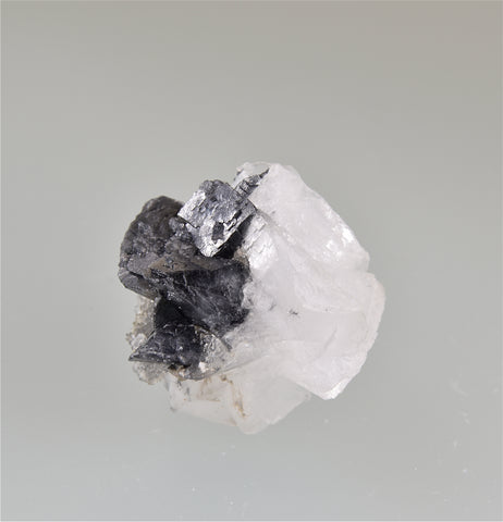 Calcite with Jamesonite Inclusions, Prinzipal Mine, Herja Complex, Baia Mare, Maramures, Romania TN 2 x 2 x 2 cm $125. Online 2/27