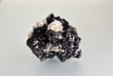 Cassiterite with Muscovite, Xuebaoding, Ping wu, Sichuan, China Medium cabinet 5.5 x 9 x 11 cm $500. Online 10/2