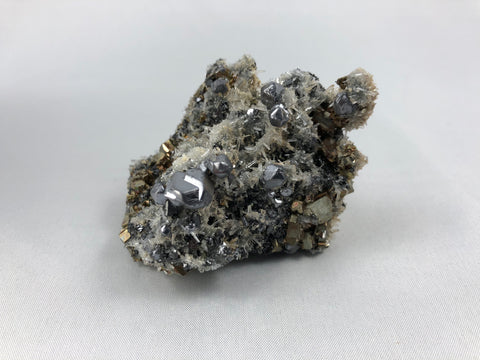 Quartz and Pyrite on Galena, Gjurdurska Mine, Madan District, Bulgaria, Mined c. 2012, Miniature 4.5 x 5.0 x 7.5 cm, $35.  Online June 12.