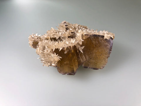 Calcite on Fluorite, Rosiclare Level attr., West Green Mine attr., Ozark-Mahoning Company attr., Cave-in-Rock District, Southern Illinois, Mined c. 1970's ex. Louis Lafayette Collection, Small Cabinet 4.5 x 7.0 x 10.5 cm, $200.  Online 10/9.