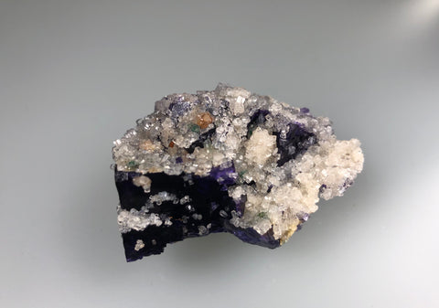 Fluorite with Calcite and Malachite, Rosiclare Level, Victory Mine, Spar Mountain District, Southern Illinois, Ron Roberts Collection UD-08, Miniature 2.5 x 4.0 x 5.0 cm, $85.  Online September 14.