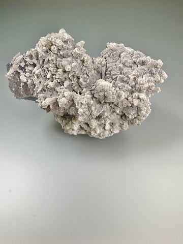 Benstonite on Calcite and Fluorite, Bethel Level, Minerva No. 1 Mine, Minerva Oil Company, Cave-in-Rock District, Southern Illinois, Mined c. 1960's, ex. Roy Smith Collection M966, Medium Cabinet 6.5 x 9.0 x 14.0 cm, $850. Online Dec. 14