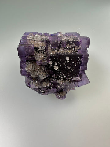 Calcite on Fluorite, Sub-Rosiclare Level, Bahama Pod, Denton Mine, Ozark-Mahoning Co., Harris Creek District, Southern Illinois, Mined c. 1992-1993, ex. Sam and Ann Koster Collection #00036, Miniature 3.3 x 3.5 x 4.2 cm, $450.  Online Dec. 19