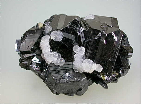 SOLD Calcite on Sphalerite, Trepca Complex, Municipality Kosovska, Kosovo, Mined 2010-2012, Minaiture 1.8 x 2.7 x .4.0 cm, $25.  Online 7/02