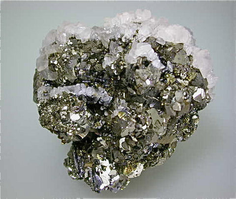 Pyrite after Pyrrhotite with Calcite, Trepca Complex, Kosovska, near Mitrovica, Kosovo Small cabinet 4 x 5 x 7 cm $60. SOLD.
