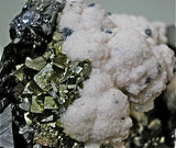 Rhodochrosite and Arsenopyrite with Sphalerite and Calcite, Trepca Complex near Mitrovica, Kosovska Municipality, Kosovo, Mined 2014, Medium Cabinet 8.0 X 9.0 X 12.0 cm, $650. SOLD